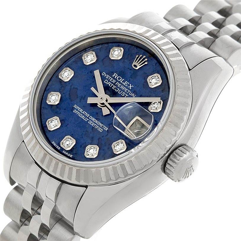 The Rolex Datejust 179174 Women's Stainless Steel Blue Dial 179174 Women's Stainless Steel Blue Dial watch is shown at an angle displaying the blue diamond dial, bezel, crown, and part of the bracelet.