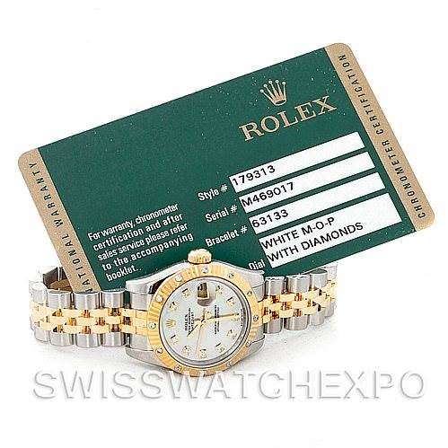 This image shows a Rolex Datejust 179313 Women's Stainless Steel Mother of Pearl Dial 179313 Women's Stainless Steel Mother of Pearl Dial watch from a front angle, alongside its chronometer certification card.
