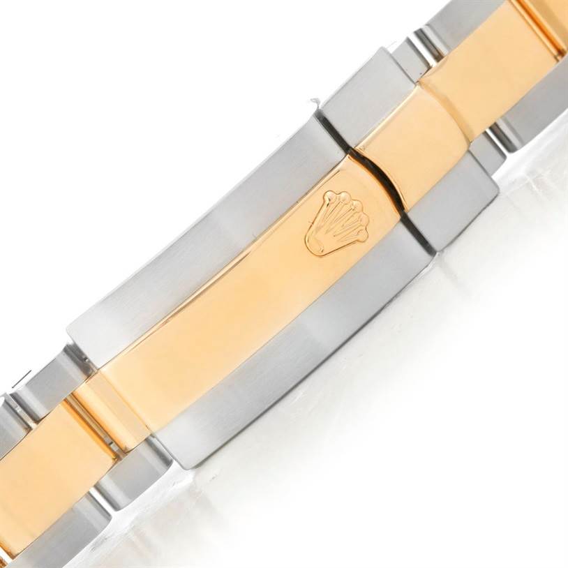 This image shows a close-up of the clasp on the bracelet of a Rolex Datejust 179163 Women's Steel and Gold (two tone) White Dial 179163 Women's Steel and Gold (two tone) White Dial watch.