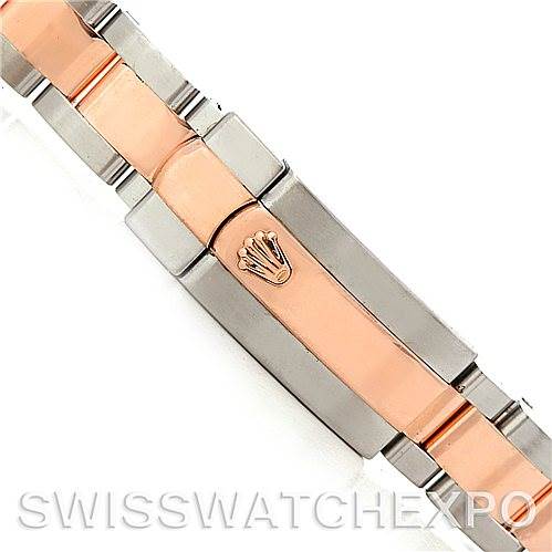 This image shows a top-down view of the bracelet clasp of a Rolex Datejust 179161 Women's Steel and Gold (two tone) Black Dial 179161 Women's Steel and Gold (two tone) Black Dial watch, featuring a combination of rose gold and stainless steel.