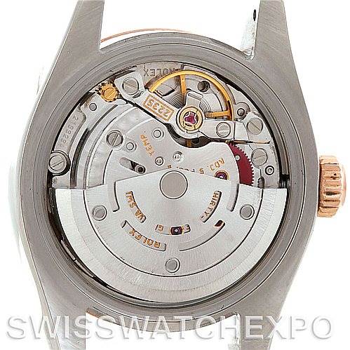 This image shows the back view of a Rolex Datejust 179161 Women's Steel and Gold (two tone) Black Dial 179161 Women's Steel and Gold (two tone) Black Dial watch, highlighting its internal mechanical movement parts.