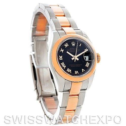 The image shows a Rolex Datejust 179161 Women's Steel and Gold (two tone) Black Dial 179161 Women's Steel and Gold (two tone) Black Dial watch at an oblique angle, highlighting the black dial, rose gold accents, and two-tone bracelet.