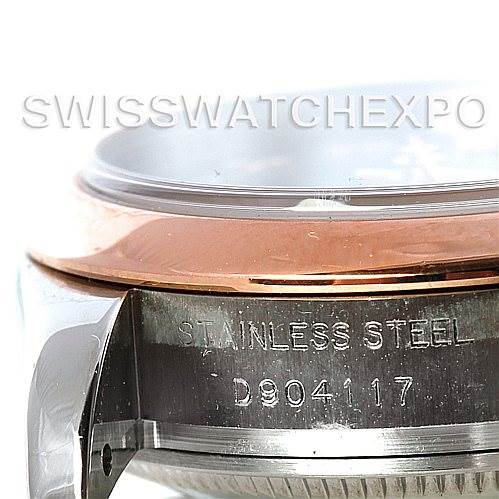 This image shows a close-up of the side of a Rolex Datejust 179161 Women's Steel and Gold (two tone) Black Dial 179161 Women's Steel and Gold (two tone) Black Dial watch case, highlighting the bezel and serial number.