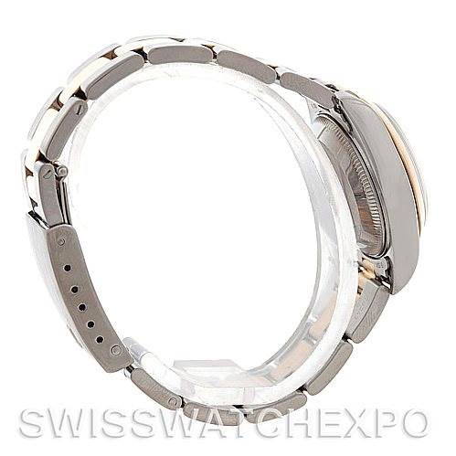 The image shows the side view of a Rolex Datejust 69163 Women
s Stainless Steel Champagne Dial 69163 Women
s Stainless Steel Champagne Dial watch, highlighting the bracelet and the right side of the watch case.