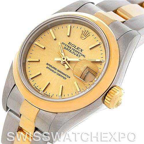 The image shows a Rolex Datejust 69163 Women
s Stainless Steel Champagne Dial 69163 Women
s Stainless Steel Champagne Dial watch at an angle highlighting its face, crown, and part of the bracelet.