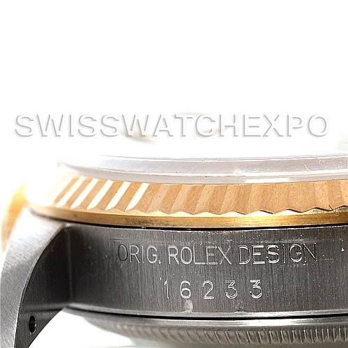This image shows the side view of a Rolex Datejust 16233 Men's Steel and Gold (two tone) Champagne Dial 16233 Men's Steel and Gold (two tone) Champagne Dial watch, highlighting the bezel and engraved model number.