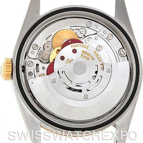 The image shows the back view of a Rolex Datejust 16233 Men's Steel and Gold (two tone) Champagne Dial 16233 Men's Steel and Gold (two tone) Champagne Dial watch, displaying its intricate internal movement components.
