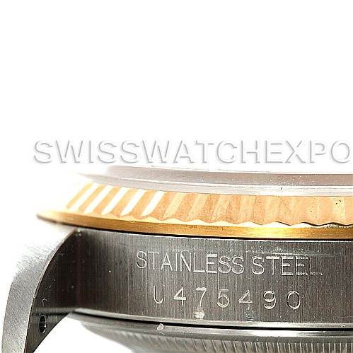 This image shows a side angle of the case with the serial number and "STAINLESS STEEL" engraving on a Rolex Datejust 16233 Men's Steel and Gold (two tone) Champagne Dial 16233 Men's Steel and Gold (two tone) Champagne Dial watch.