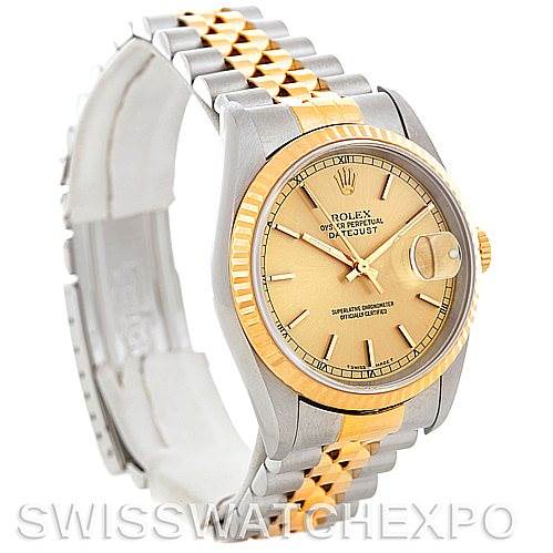 This image shows a Rolex Datejust 16233 Men's Steel and Gold (two tone) Champagne Dial 16233 Men's Steel and Gold (two tone) Champagne Dial watch at a three-quarter angle, highlighting the two-tone bracelet, dial, and fluted bezel.