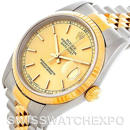 This image shows a Rolex Datejust 16233 Men's Steel and Gold (two tone) Champagne Dial 16233 Men's Steel and Gold (two tone) Champagne Dial watch at an angled view with a focus on the dial, bezel, crown, and the Jubilee bracelet.