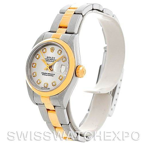 This image shows a Rolex Datejust 79163 Women's Steel and Gold (two tone) Silver Dial 79163 Women's Steel and Gold (two tone) Silver Dial watch from an angled side view, highlighting its face, bracelet, and crown.