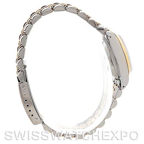 This side view of the Rolex Datejust 69173 Women's Stainless Steel Champagne Dial 69173 Women's Stainless Steel Champagne Dial watch shows the band and part of the case.