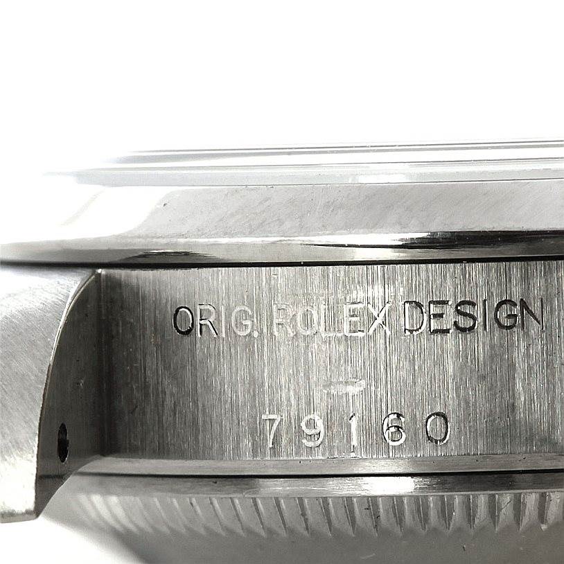 The image shows a close-up side view of the casing of the Rolex Datejust 79160 Women
s Stainless Steel White Dial 79160 Women
s Stainless Steel White Dial watch, highlighting the model number "79160" and "ORIG. ROLEX DESIGN" engraving.