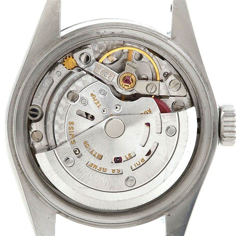 The image shows the internal mechanism and movement of a Rolex Datejust 79160 Women
s Stainless Steel White Dial 79160 Women
s Stainless Steel White Dial watch with the case back removed.