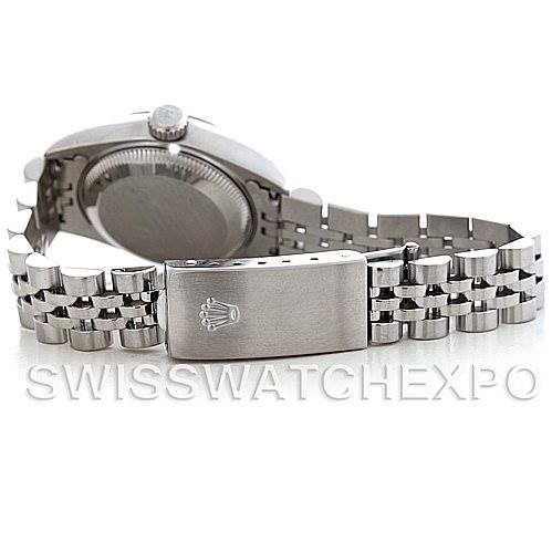 The image shows the back view of a Rolex Datejust 79174 Women's Stainless Steel Blue Dial 79174 Women's Stainless Steel Blue Dial watch, focusing on the stainless steel bracelet and clasp with the brand logo.