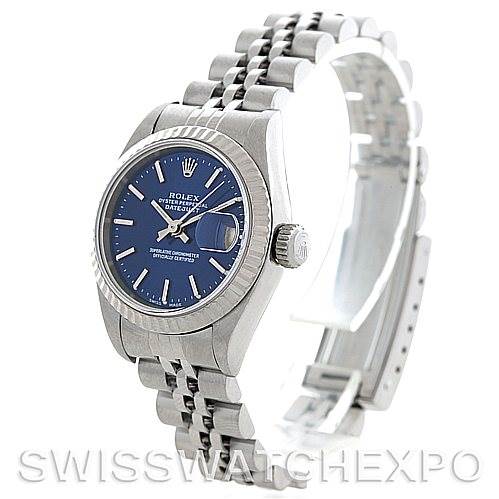 The Rolex Datejust 79174 Women's Stainless Steel Blue Dial 79174 Women's Stainless Steel Blue Dial watch is shown at a three-quarter angle, displaying its blue dial, silver casing, and Jubilee bracelet.