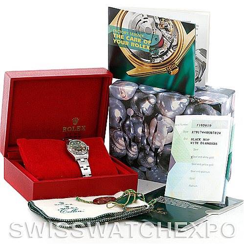 The image shows a Rolex Datejust 79174 Women's Stainless Steel Mother of Pearl Dial 79174 Women's Stainless Steel Mother of Pearl Dial watch at a frontal angle, inside its box, alongside manuals, tags, and original packaging.