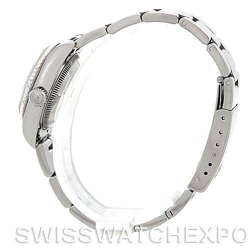 The image shows a side view of the Rolex Datejust 79174 Women's Stainless Steel Mother of Pearl Dial 79174 Women's Stainless Steel Mother of Pearl Dial watch, highlighting the case, crown, and bracelet.