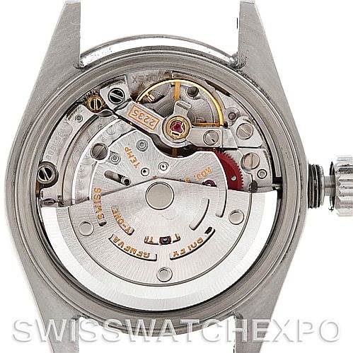 The image shows the back of a Rolex Datejust 79174 Women's Stainless Steel Mother of Pearl Dial 79174 Women's Stainless Steel Mother of Pearl Dial watch, highlighting its internal movement and rotor mechanism.