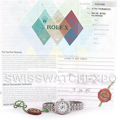 The image shows a Rolex Datejust 79174 Women's Stainless Steel White Dial 79174 Women's Stainless Steel White Dial watch, warranty paper, certification document, and two Rolex tags.