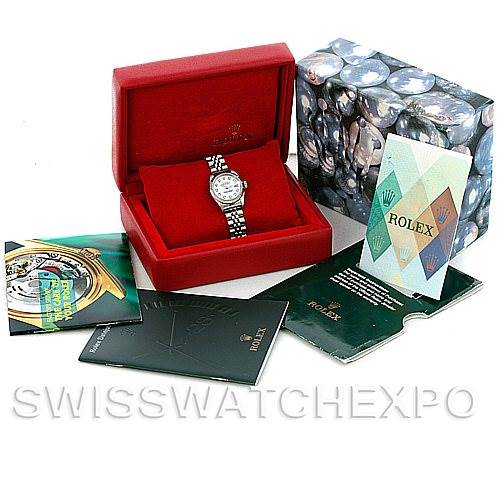 This image shows a Rolex Datejust 79174 Women's Stainless Steel White Dial 79174 Women's Stainless Steel White Dial watch in its red box, surrounded by Rolex booklets and packaging from a front angle.