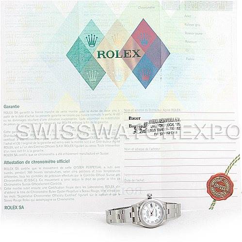 The image shows a Rolex Datejust 79160 Women's Stainless Steel White Dial 79160 Women's Stainless Steel White Dial watch alongside its warranty card and paperwork from a frontal angle.