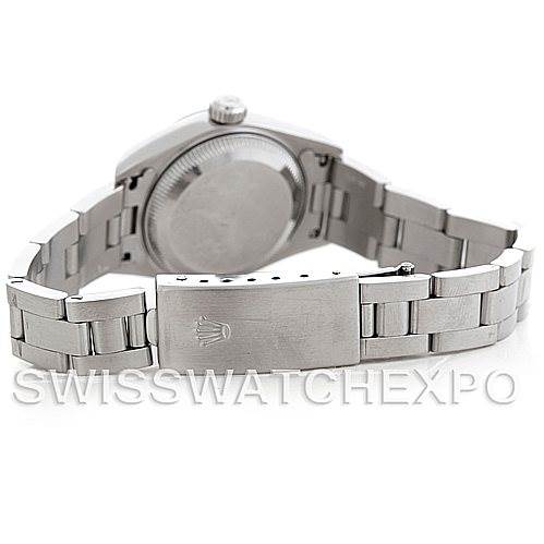 The image shows the back case and folded clasp of a Rolex Datejust 69174 Women
s Stainless Steel Mother of Pearl Dial 69174 Women
s Stainless Steel Mother of Pearl Dial watch, viewed from the reverse side.