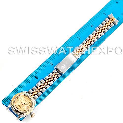 The image shows a Rolex Datejust 69173 Women's Stainless Steel Champagne Dial 69173 Women's Stainless Steel Champagne Dial watch laid flat, with the face on the left and the jubilee bracelet parallel to a ruler for measurement.