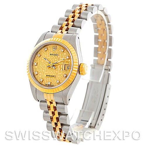This image shows a Rolex Datejust 69173 Women's Stainless Steel Champagne Dial 69173 Women's Stainless Steel Champagne Dial watch at a slight angle, highlighting its gold and silver bracelet, dial, bezel, and crown.