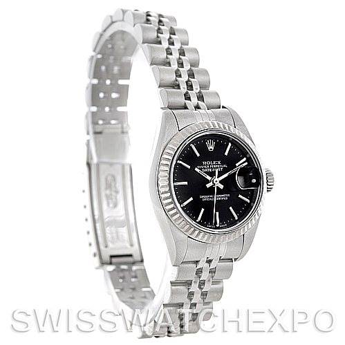 This image shows a Rolex Datejust 79174 Women's Stainless Steel Black Dial 79174 Women's Stainless Steel Black Dial watch from a side angle, highlighting its bracelet, black dial, and bezel.