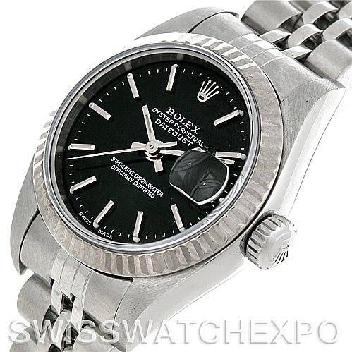 This image shows a Rolex Datejust 79174 Women's Stainless Steel Black Dial 79174 Women's Stainless Steel Black Dial watch at a slight angle, highlighting the dial, bezel, crown, and part of the bracelet.