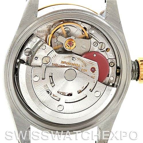 This image shows the movement and inner mechanism of a Rolex Datejust 69163 Women's Stainless Steel Champagne Dial 69163 Women's Stainless Steel Champagne Dial watch from a rear, open-case perspective.
