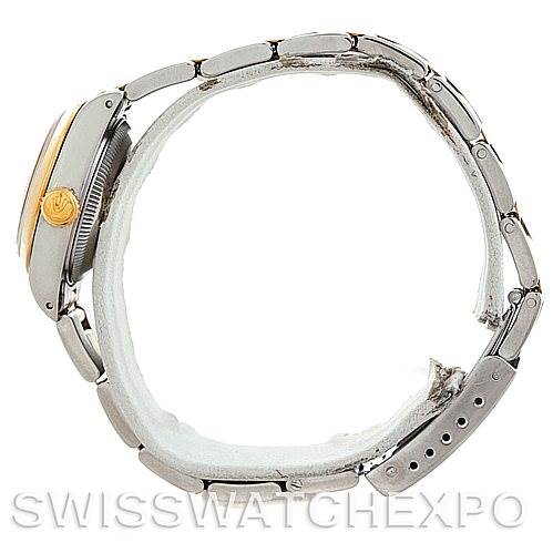 This image shows a side view of a Rolex Datejust 69163 Women's Stainless Steel Champagne Dial 69163 Women's Stainless Steel Champagne Dial, highlighting its bracelet, clasp, case, and crown.