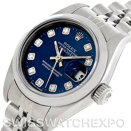 This image shows the Rolex Datejust 79240 Women's Stainless Steel Blue Dial 79240 Women's Stainless Steel Blue Dial model from a slightly oblique angle, highlighting the watch face, bezel, and part of the bracelet.