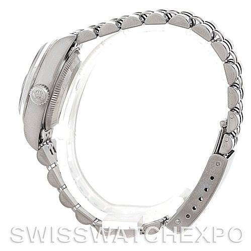 The image shows a side profile view of the Rolex Datejust 79240 Women's Stainless Steel Blue Dial 79240 Women's Stainless Steel Blue Dial watch, highlighting the crown and the bracelet.