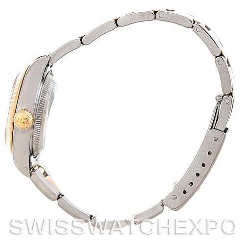 The watch is a Rolex Datejust 69173 Women's Stainless Steel Silver Dial 69173 Women's Stainless Steel Silver Dial model shown from the side, highlighting the case, bezel, crown, and partial bracelet.
