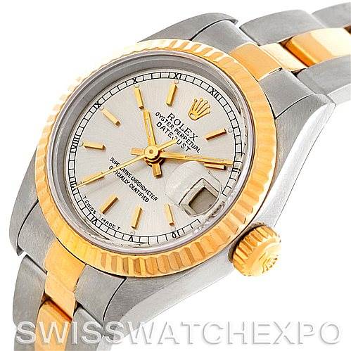 The image shows a close-up angle of the Rolex Datejust 69173 Women's Stainless Steel Silver Dial 69173 Women's Stainless Steel Silver Dial watch, highlighting the bezel, dial, crown, and part of the two-tone bracelet.