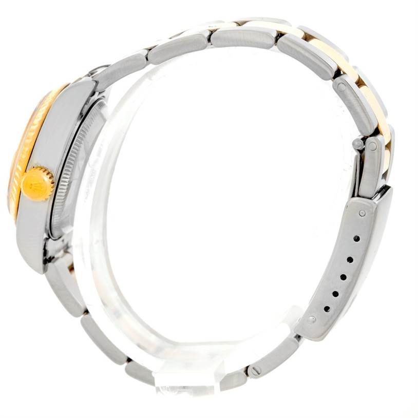 The image shows a side view of a Rolex Datejust 69173 Women's Stainless Steel White Dial 69173 Women's Stainless Steel White Dial watch, highlighting the crown and part of the bracelet.