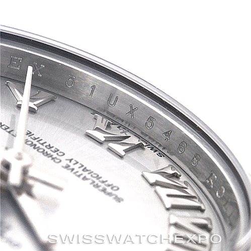 The image shows a close-up angle of a Rolex Datejust 179174 Women's Stainless Steel Grey Dial 179174 Women's Stainless Steel Grey Dial watch, focusing on the dial, hands, and inner bezel with the serial number.