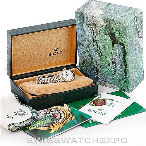 The image shows a Rolex Datejust 79173 Women's Stainless Steel Mother of Pearl Dial 79173 Women's Stainless Steel Mother of Pearl Dial watch inside its open box with additional packaging and booklets displayed around it.