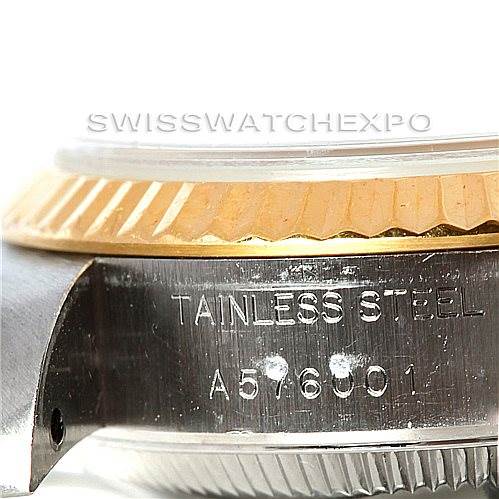 The image shows a close-up side view of a Rolex Datejust 79173 Women's Stainless Steel Mother of Pearl Dial 79173 Women's Stainless Steel Mother of Pearl Dial watch, displaying the bezel and part of the stainless steel case with engravings.