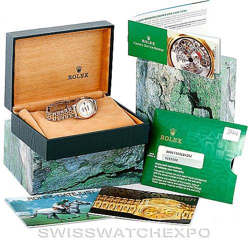 The image shows a Rolex Datejust 69173 Women's Stainless Steel White Dial 69173 Women's Stainless Steel White Dial watch with its box, service booklet, warranty card, and promotional material.