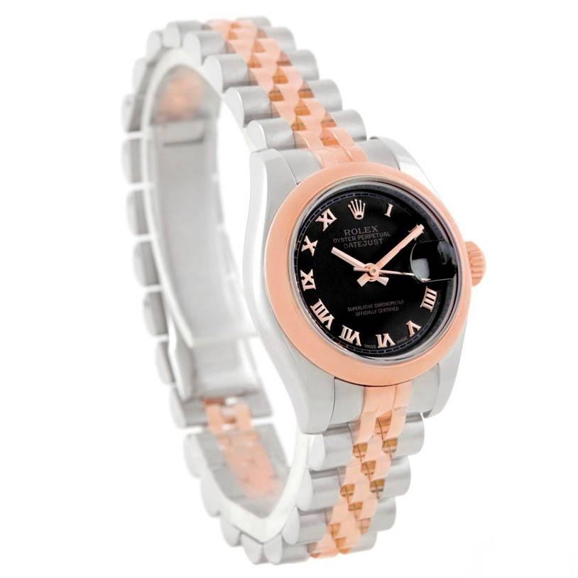 The Rolex Datejust 179161 Women's Steel and Gold (two tone) Black Dial 179161 Women's Steel and Gold (two tone) Black Dial watch is shown at a side angle, highlighting its two-tone bracelet and black dial with Roman numerals.