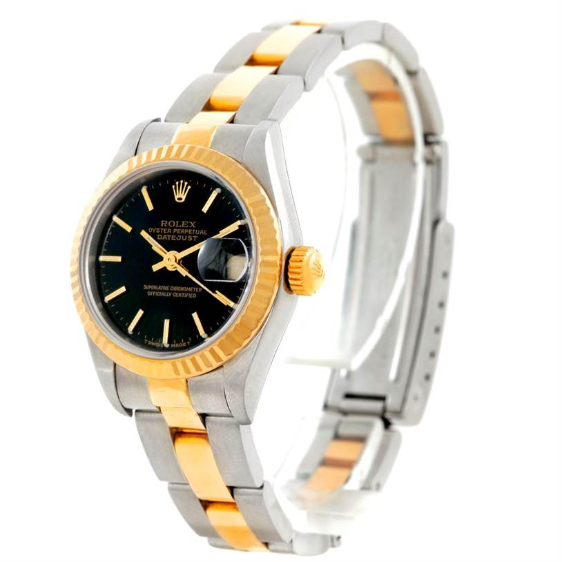 The angled shot shows the face, side, and bracelet of the Rolex Datejust 79163 Women's Steel and Gold (two tone) Black Dial 79163 Women's Steel and Gold (two tone) Black Dial watch, highlighting its two-tone gold and silver design.