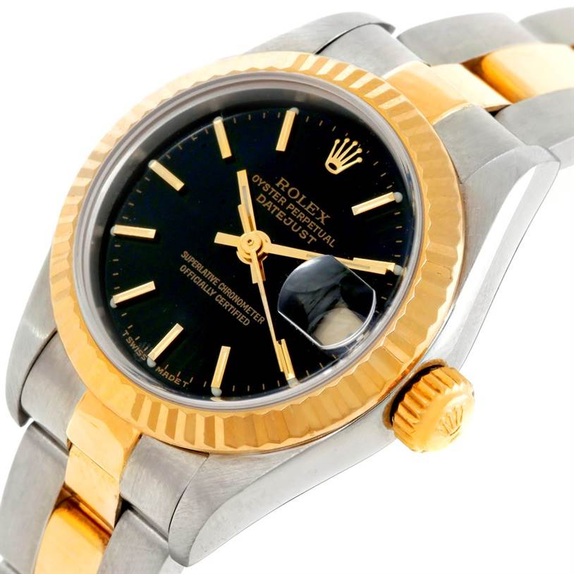 The image shows a close-up of the Rolex Datejust 79163 Women's Steel and Gold (two tone) Black Dial 79163 Women's Steel and Gold (two tone) Black Dial watch at an angle, highlighting the bezel, dial, crown, and part of the bracelet.
