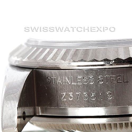 The image shows a close-up side view of the Stainless Steel case and engraved serial number of a Rolex Datejust 179174 Women's Stainless Steel Grey Dial 179174 Women's Stainless Steel Grey Dial watch.