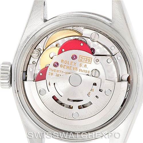 This image shows the open back of a Rolex Datejust 69174 Women's Stainless Steel Pink Dial 69174 Women's Stainless Steel Pink Dial watch, revealing its internal movement components.