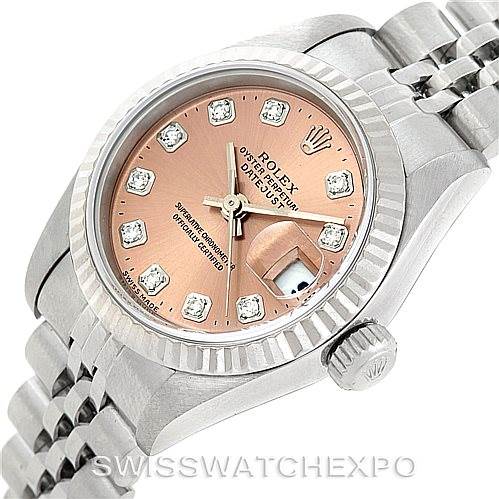 This image shows a Rolex Datejust 69174 Women's Stainless Steel Pink Dial 69174 Women's Stainless Steel Pink Dial watch from an upper side angle, displaying the dial, bezel, crown, and part of the bracelet.