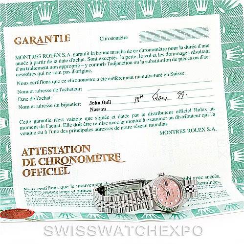 The image shows a Rolex Datejust 69174 Women's Stainless Steel Pink Dial 69174 Women's Stainless Steel Pink Dial watch alongside its official warranty and chronometer certificate documents.
