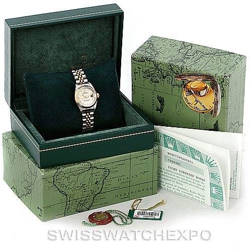The image shows a Rolex Datejust 69173 Women
s Stainless Steel Beige Dial 69173 Women
s Stainless Steel Beige Dial watch in its opened box, with additional packaging, tags, and documents.